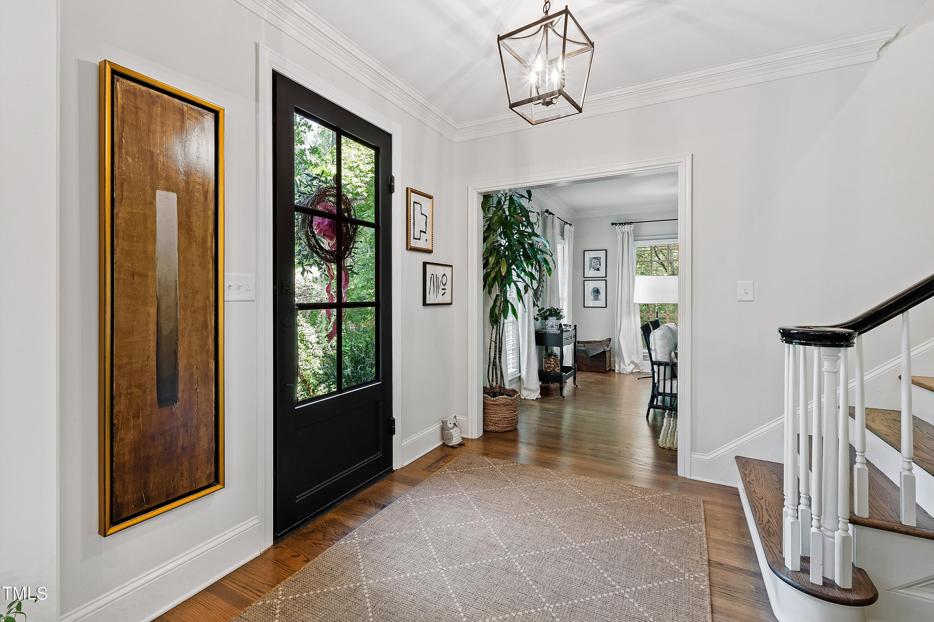 612 Marlowe Road Raleigh, NC 27609 - Photo 40 of 60 a view of a hallway with furniture and a livingroom