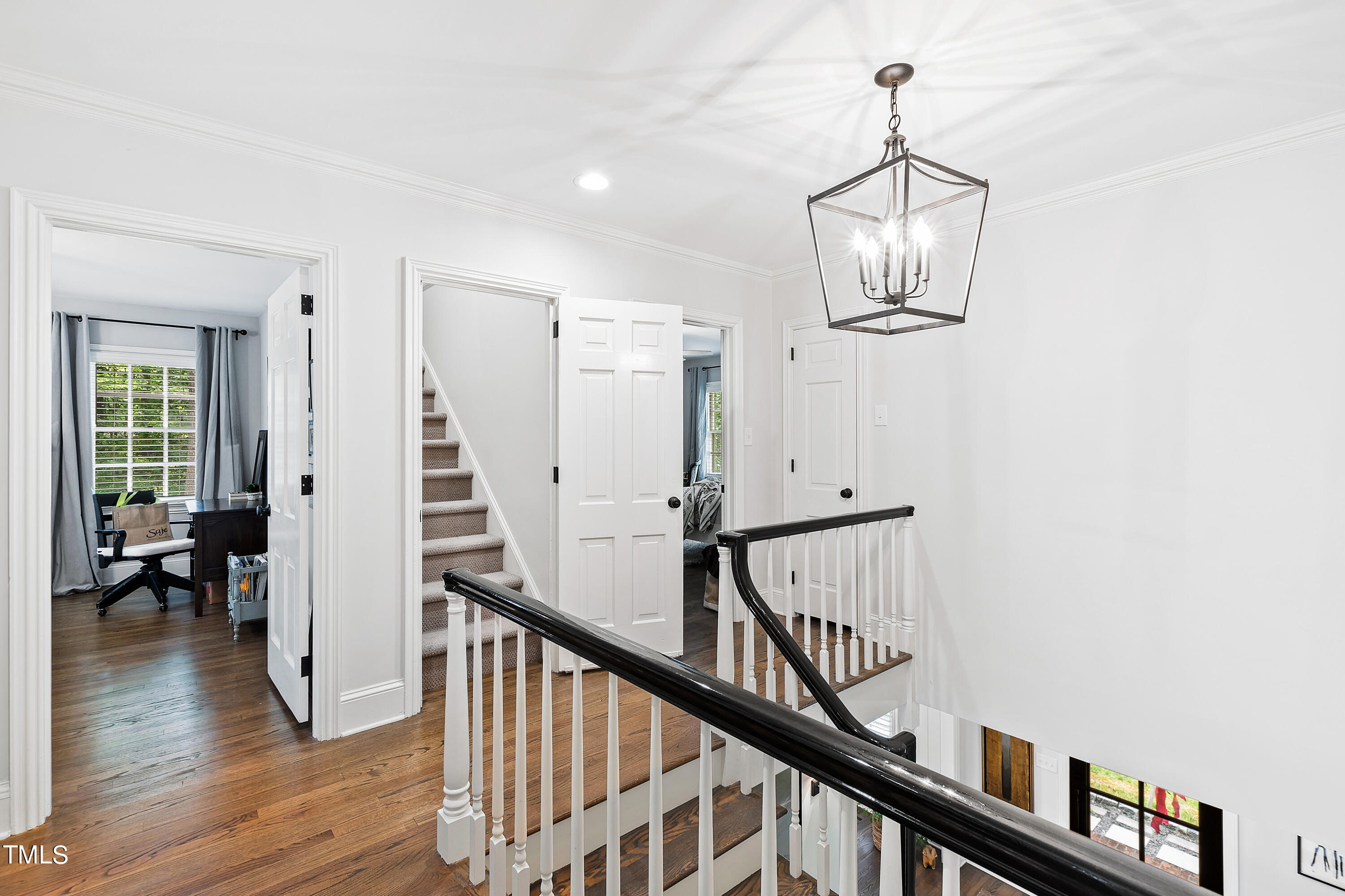 612 Marlowe Road Raleigh, NC 27609 - Photo 53 of 60 a view of entryway and hall with wooden floor