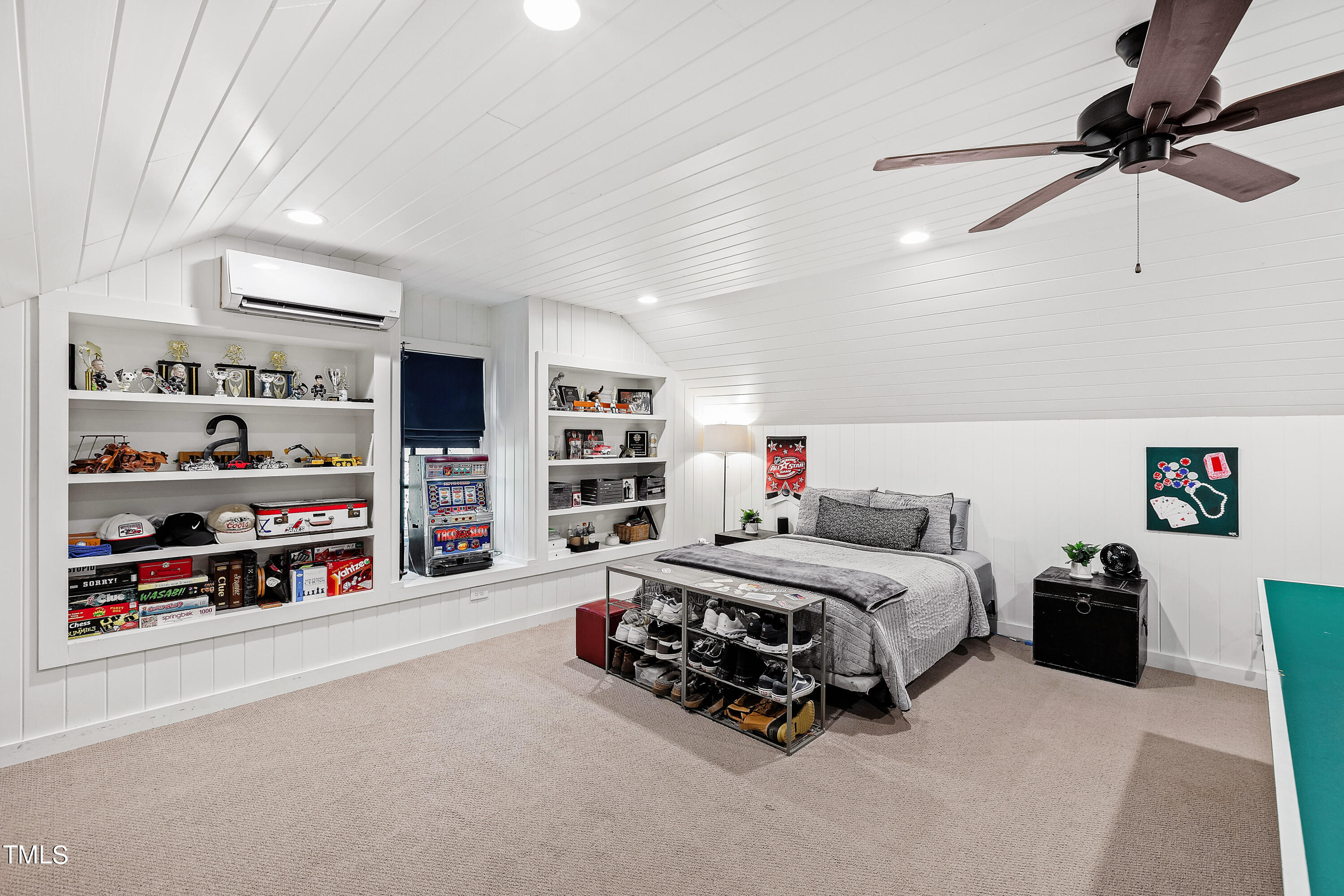 612 Marlowe Road Raleigh, NC 27609 - Photo 59 of 60 a bedroom with furniture and a book shelf