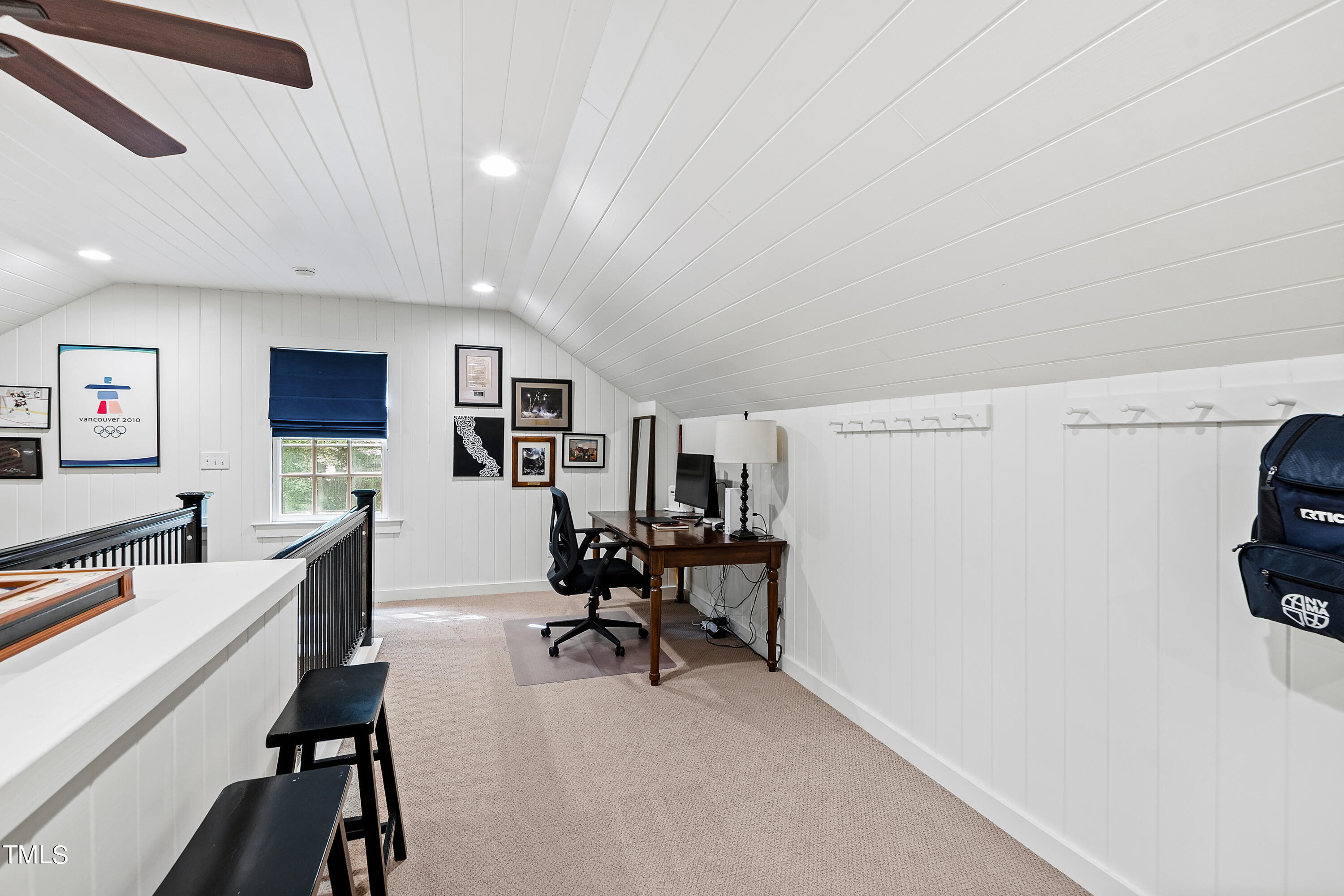 612 Marlowe Road Raleigh, NC 27609 - Photo 60 of 60 a view of a livingroom with workspace and a couch