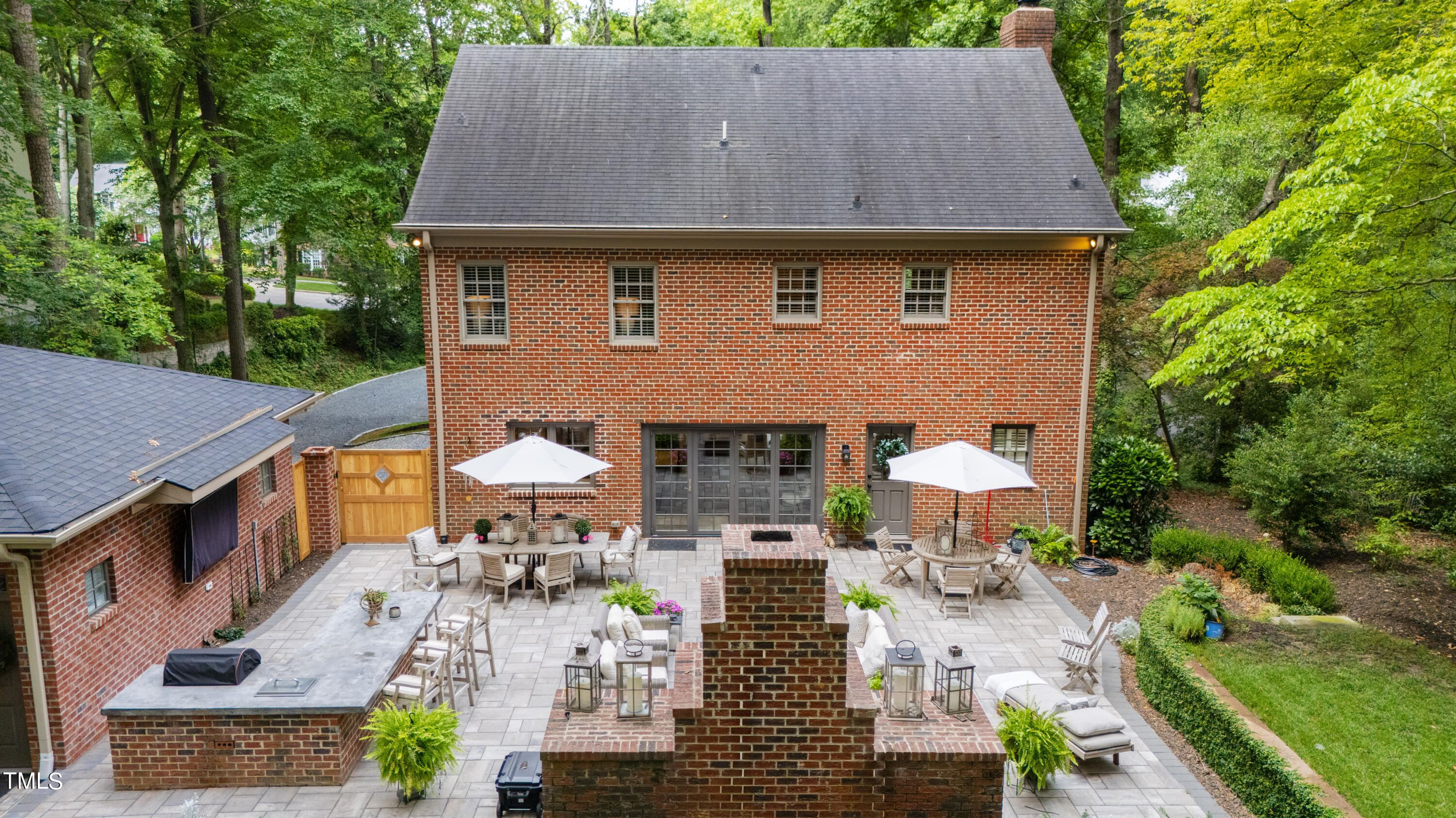 612 Marlowe Road Raleigh, NC 27609 - Photo 9 of 60 an aerial view of a house with table and chairs