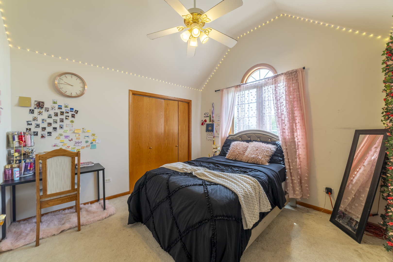 1071 Yamma Ridge New Lenox, IL 60451 - Photo 30 of 51 a bedroom with a bed and a chandelier
