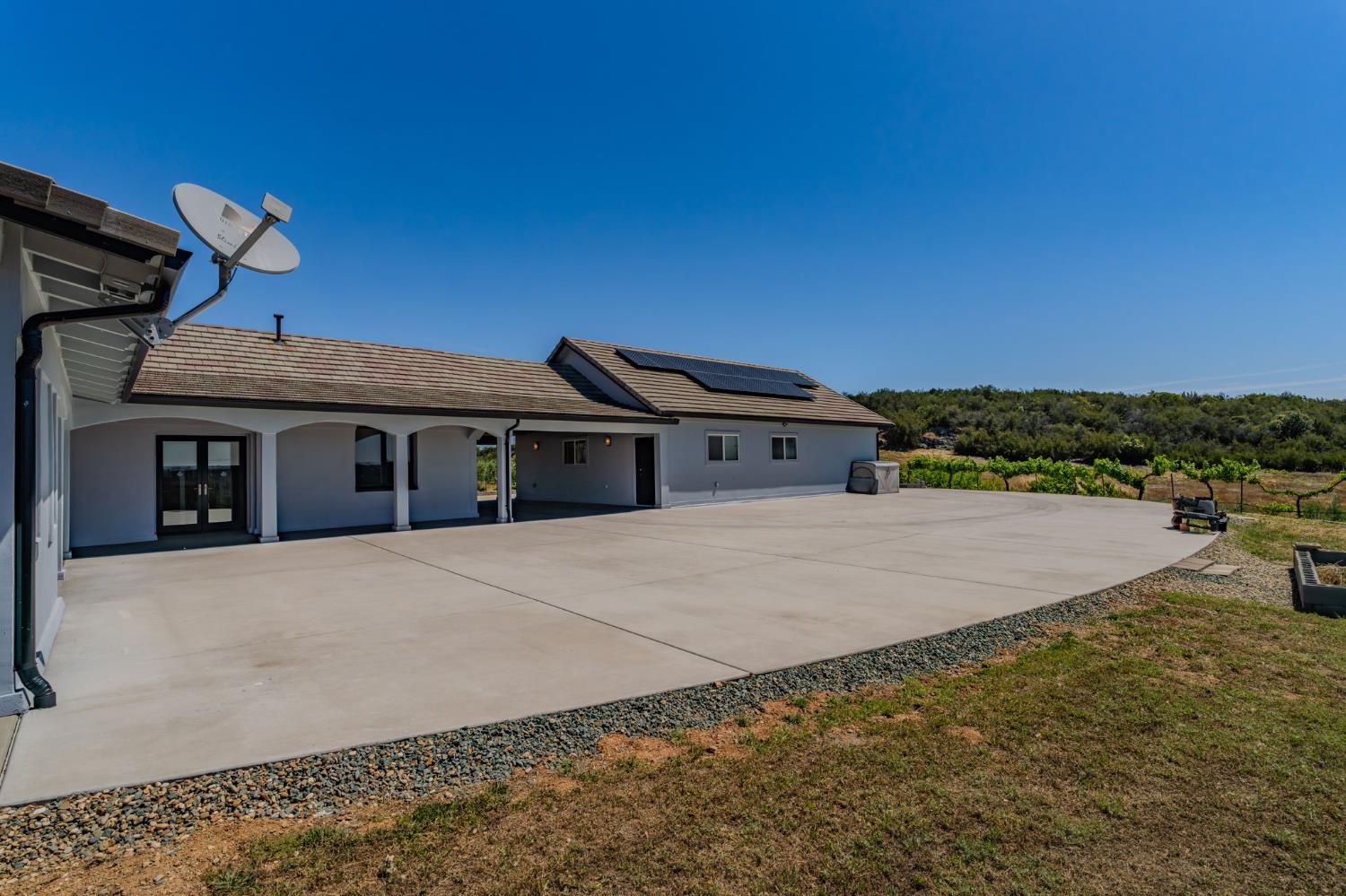 15070 Willow Creek Road Ione, CA 95640 - Photo 10 of 66 a front view of a house with a yard