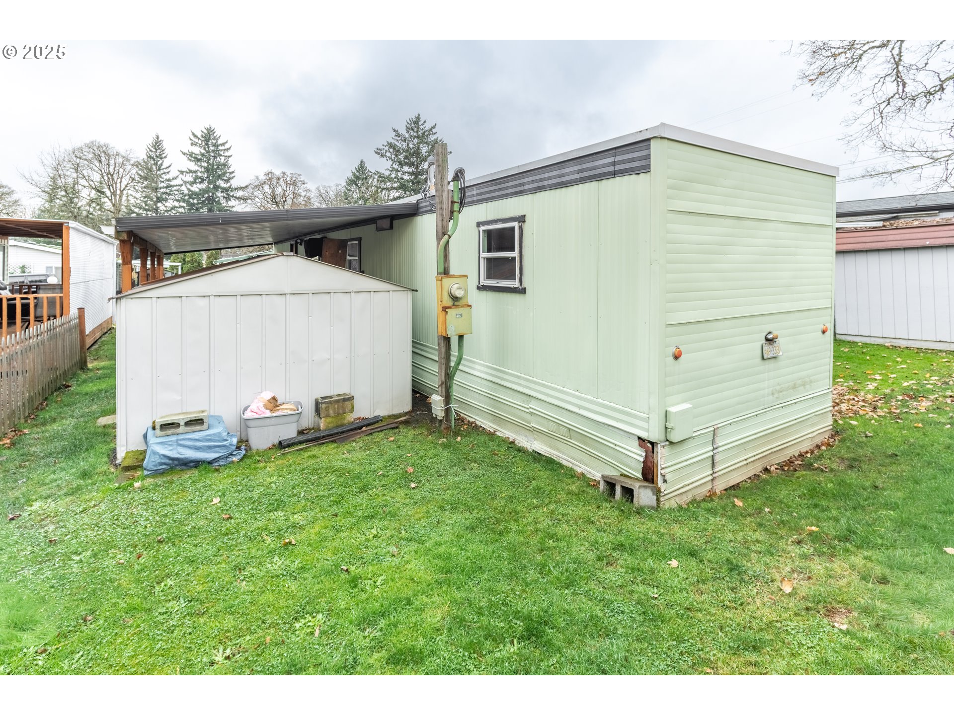 3500 Southeast Concord Road, Unit 65 Milwaukie, OR 97267 - Photo 18 of 19 a view of a back yard of the house