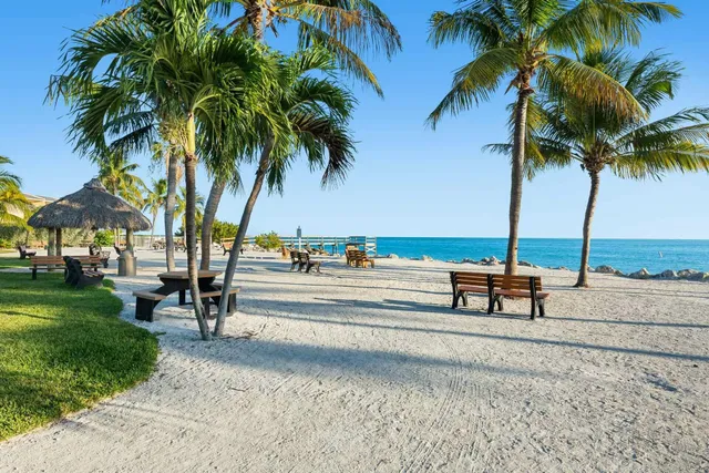 a view of ocean with outdoor seating