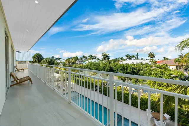 a view of a balcony with city view