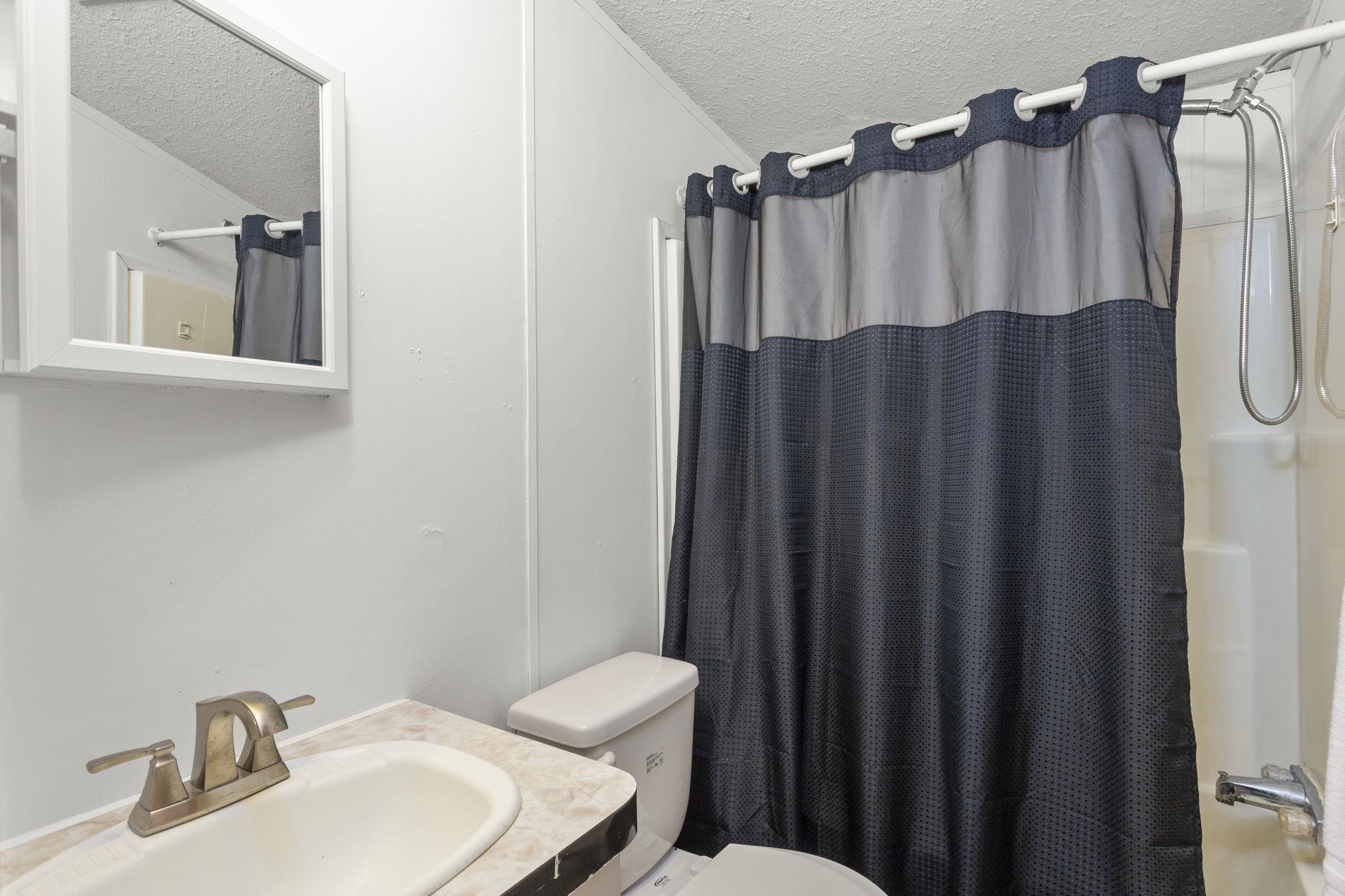 14623 Runions Creek Road Broadway, VA 22815 - Photo 11 of 30 a bathroom with a sink and a mirror
