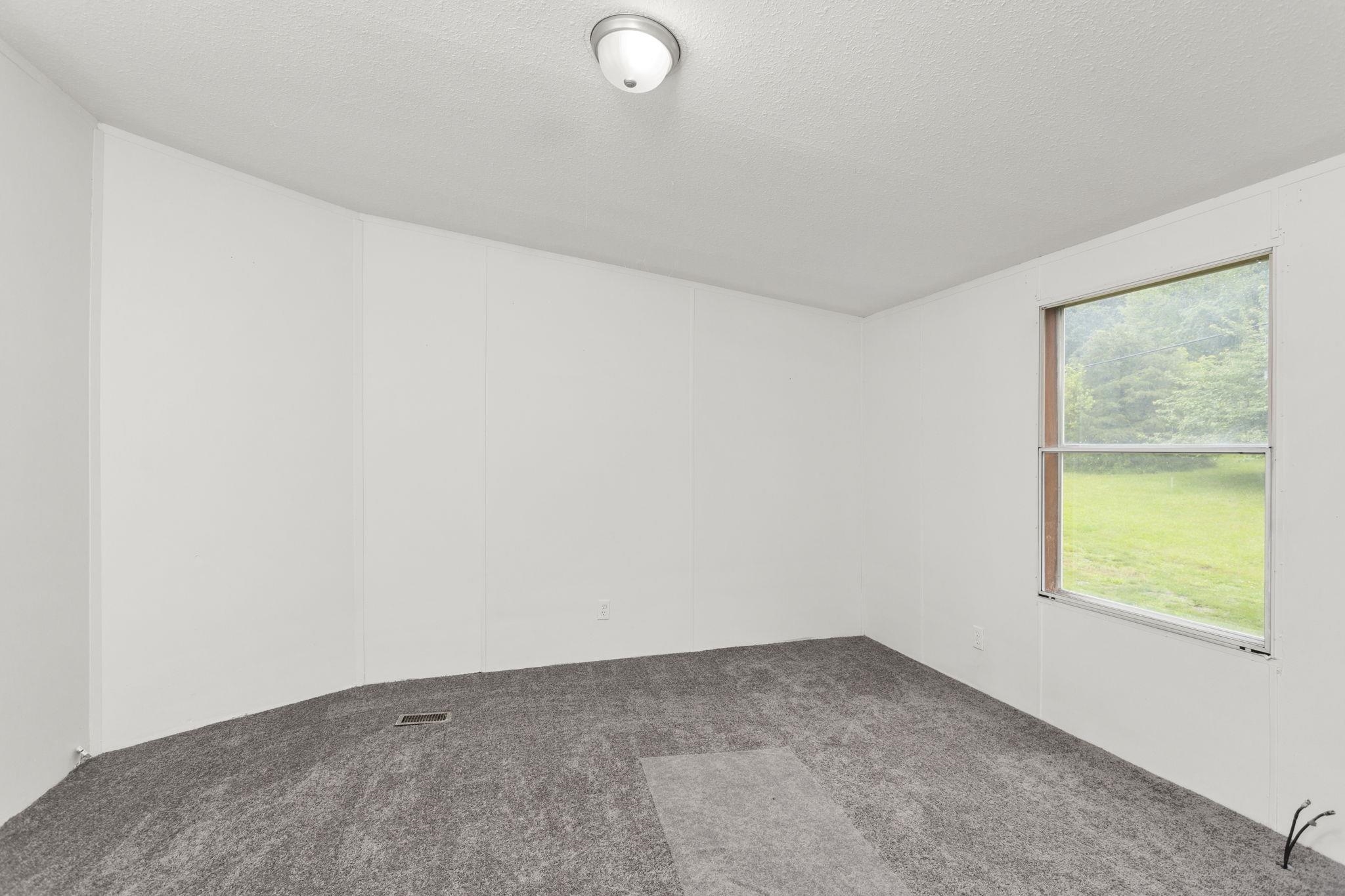 14623 Runions Creek Road Broadway, VA 22815 - Photo 15 of 30 an empty room with a window