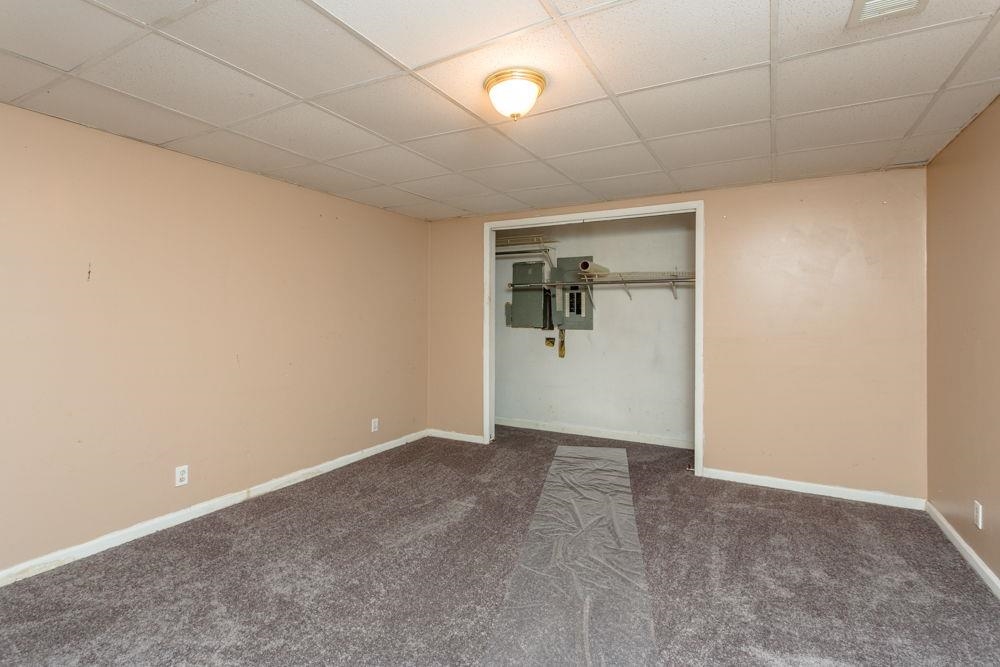 14623 Runions Creek Road Broadway, VA 22815 - Photo 21 of 30 an empty room with a empty space and a ceiling fan
