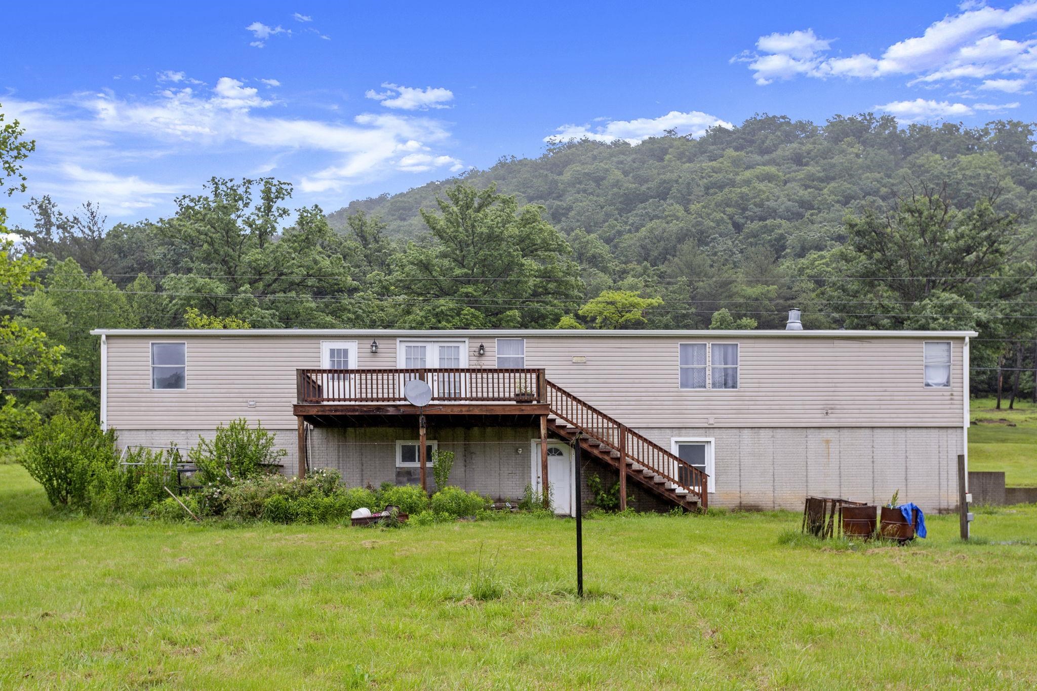 14623 Runions Creek Road Broadway, VA 22815 - Photo 24 of 30 a view of backyard with small cabin