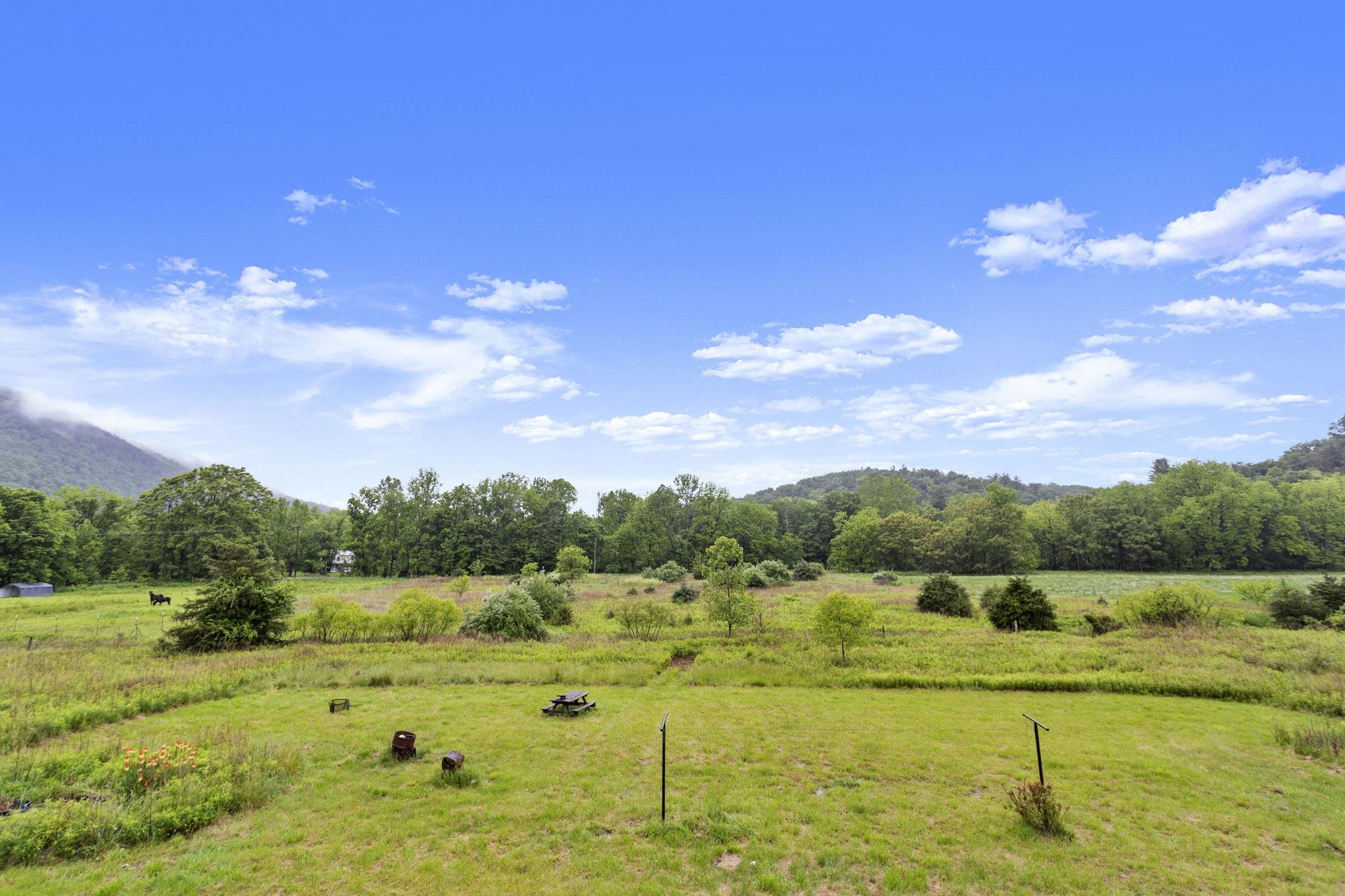 14623 Runions Creek Road Broadway, VA 22815 - Photo 29 of 30 a view of a lake with houses in the background