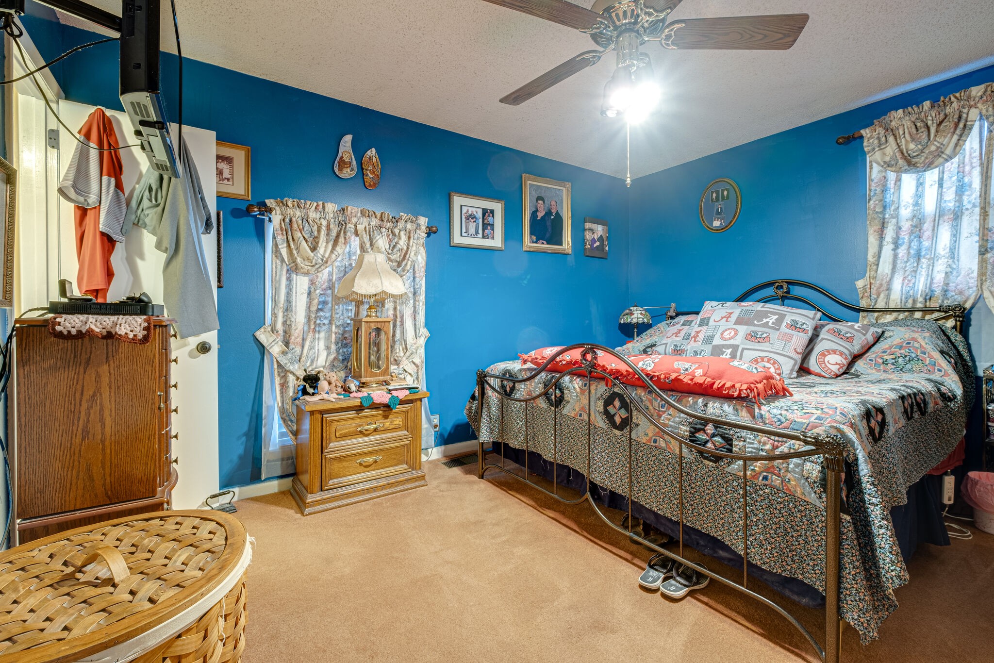 4840 Concord Drive Hermitage, TN 37076 - Photo 13 of 34 a bedroom with a bed and a chandelier