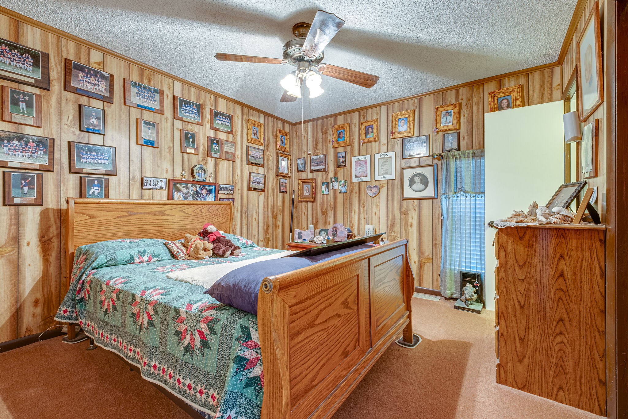 4840 Concord Drive Hermitage, TN 37076 - Photo 16 of 34 a bedroom with furniture and a chandelier