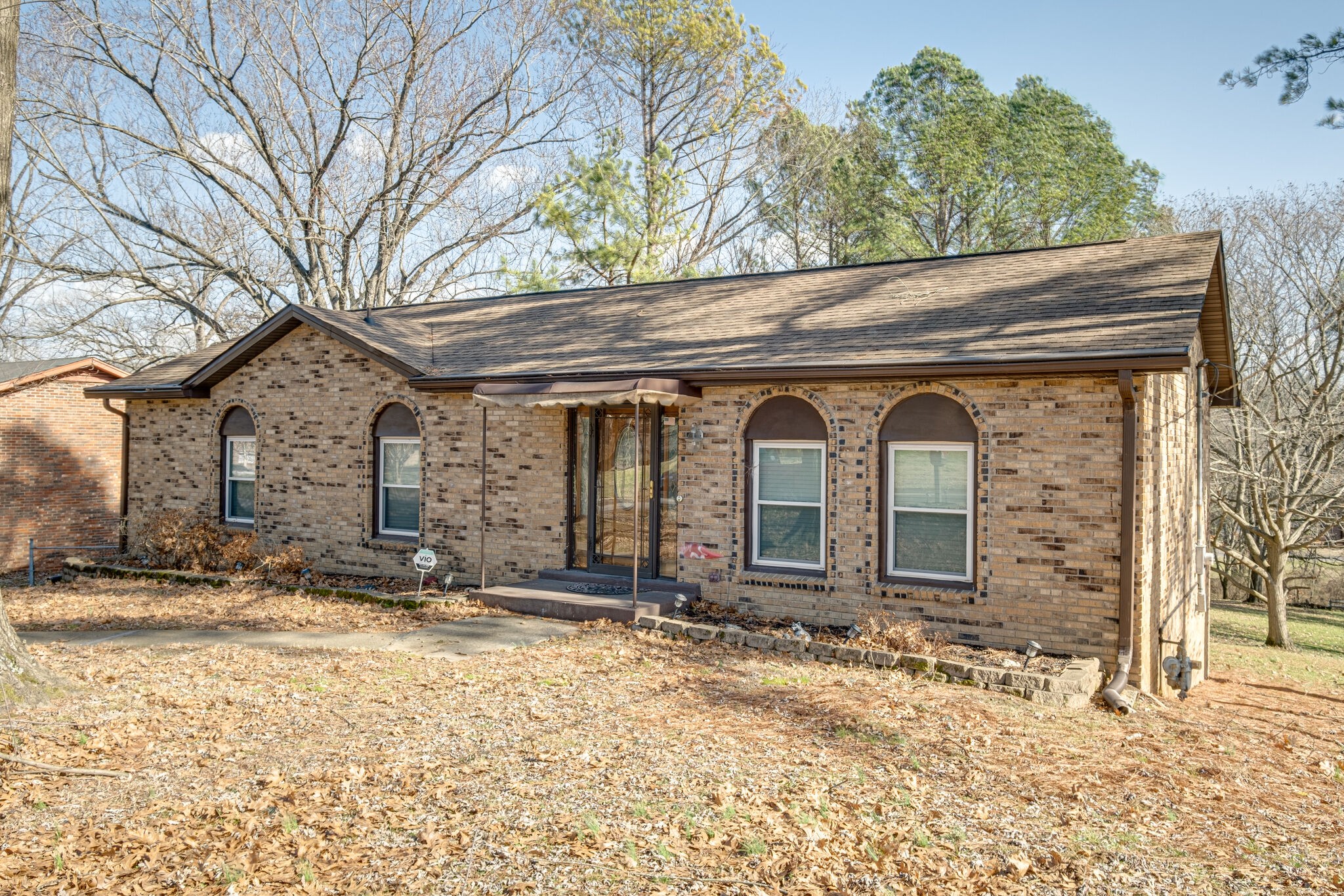4840 Concord Drive Hermitage, TN 37076 - Photo 3 of 34 a front view of a house with a yard