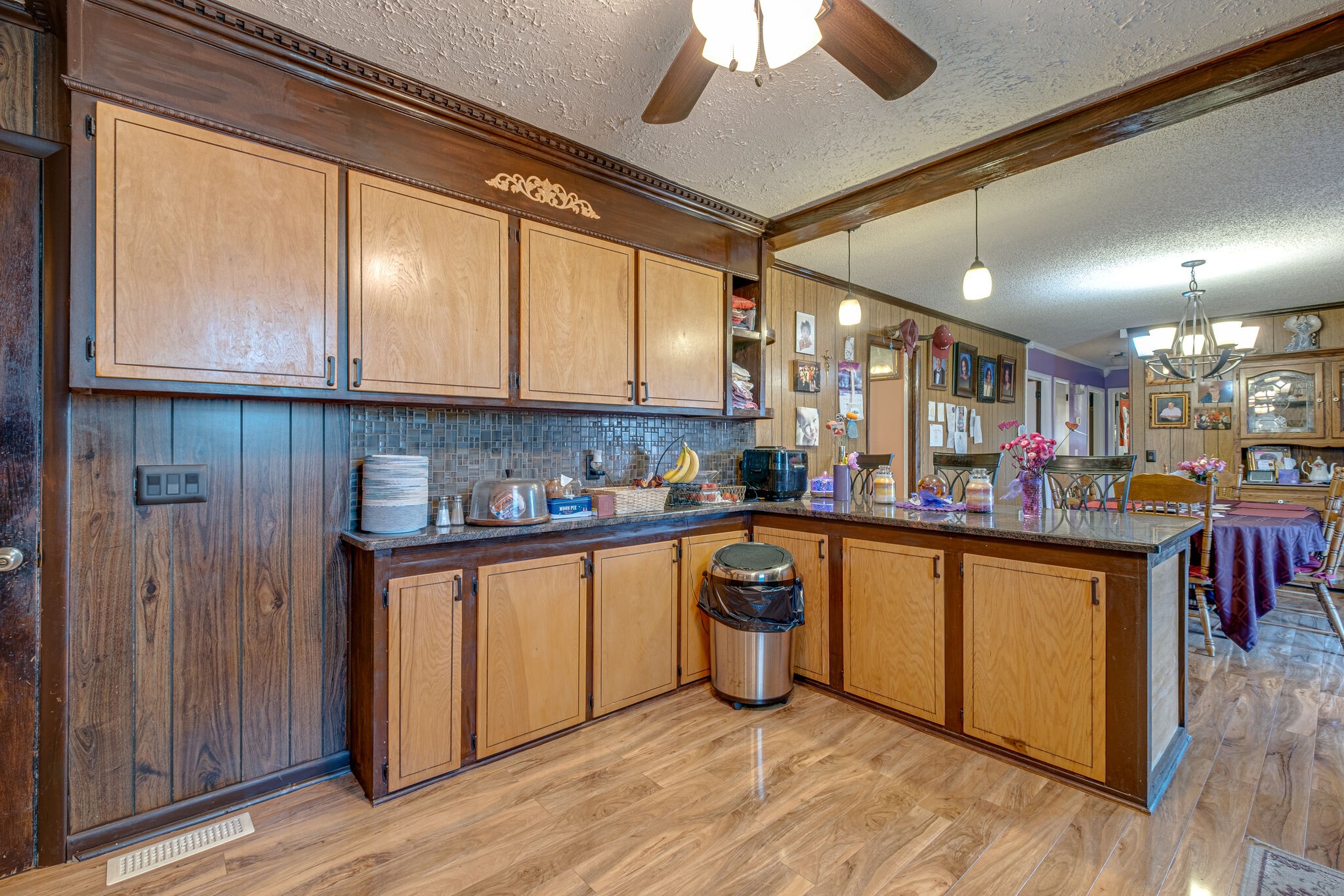 4840 Concord Drive Hermitage, TN 37076 - Photo 6 of 34 a kitchen with stainless steel appliances granite countertop a sink cabinets and wooden floor