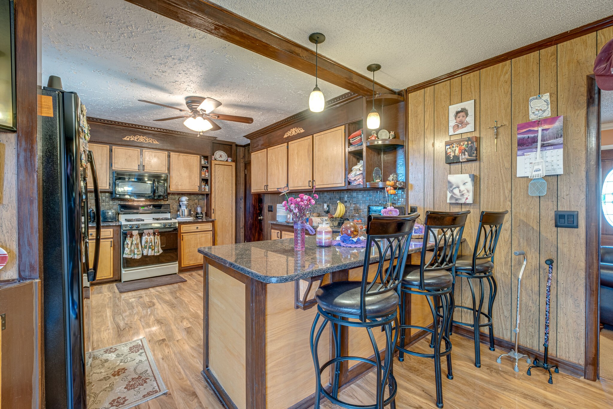 4840 Concord Drive Hermitage, TN 37076 - Photo 7 of 34 a view of a dining room with furniture window and wooden floor