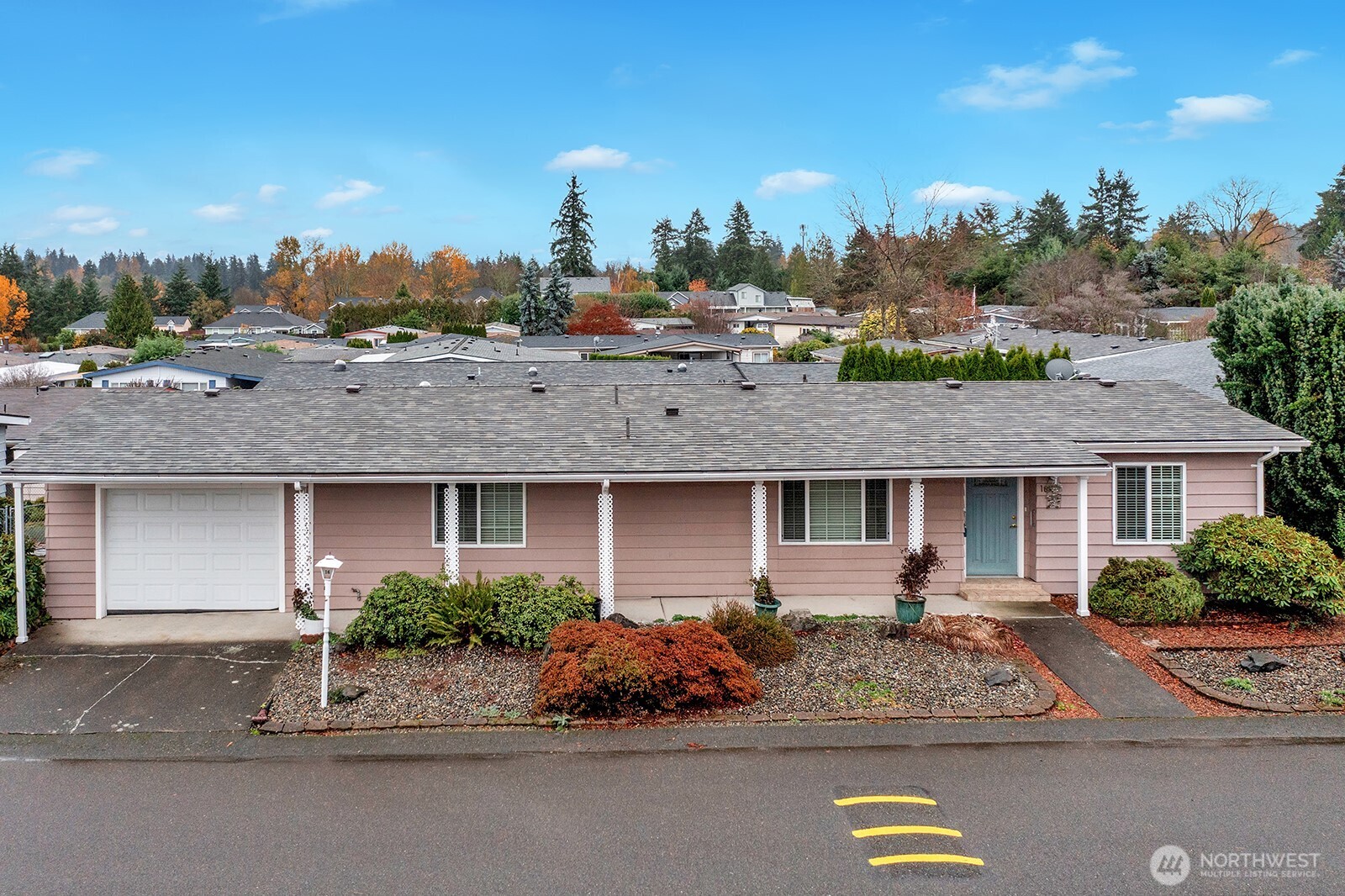 2500 Alder Street, Unit 16 Milton, WA 98354 - Photo 1 of 20 a front view of a house with a garden and plants