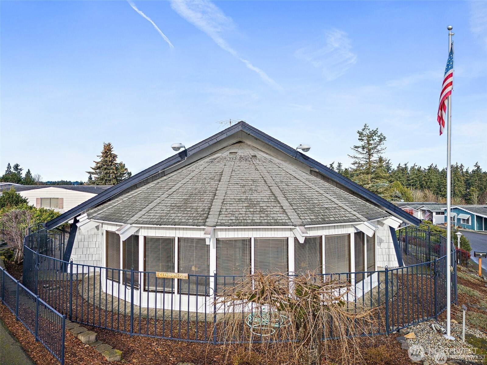 2500 Alder Street, Unit 16 Milton, WA 98354 - Photo 16 of 20 a front view of a house with balcony