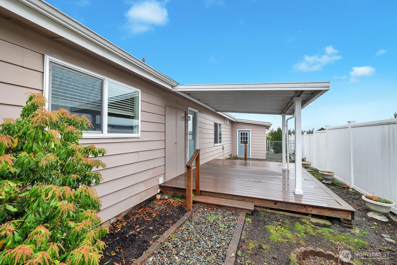 2500 Alder Street, Unit 16 Milton, WA 98354 - Photo 2 of 20 a view of a backyard with a patio