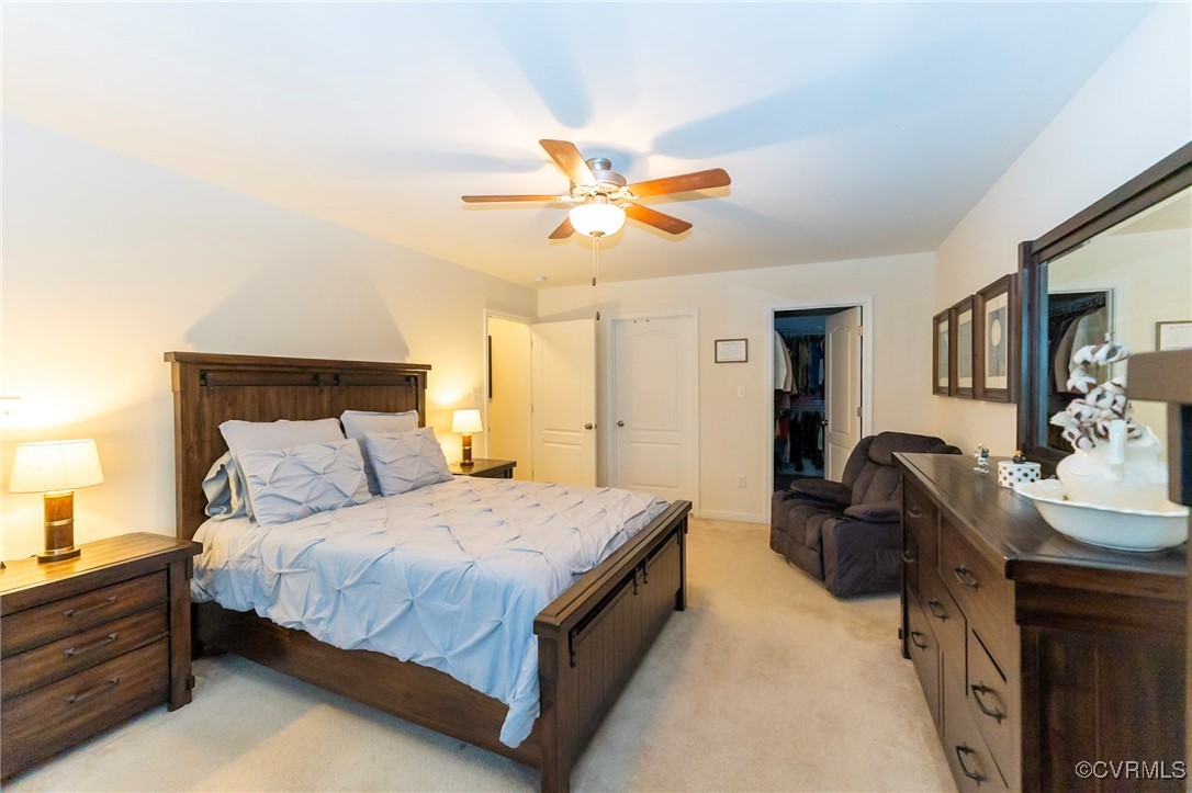 3206 Rimswell Court Midlothian, VA 23112 - Photo 17 of 38 Carpeted bedroom featuring a walk in closet, ceili