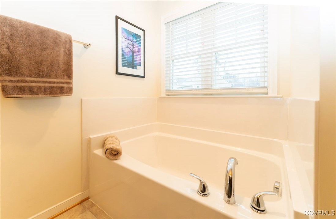 3206 Rimswell Court Midlothian, VA 23112 - Photo 22 of 38 Bathroom featuring a tub to relax in