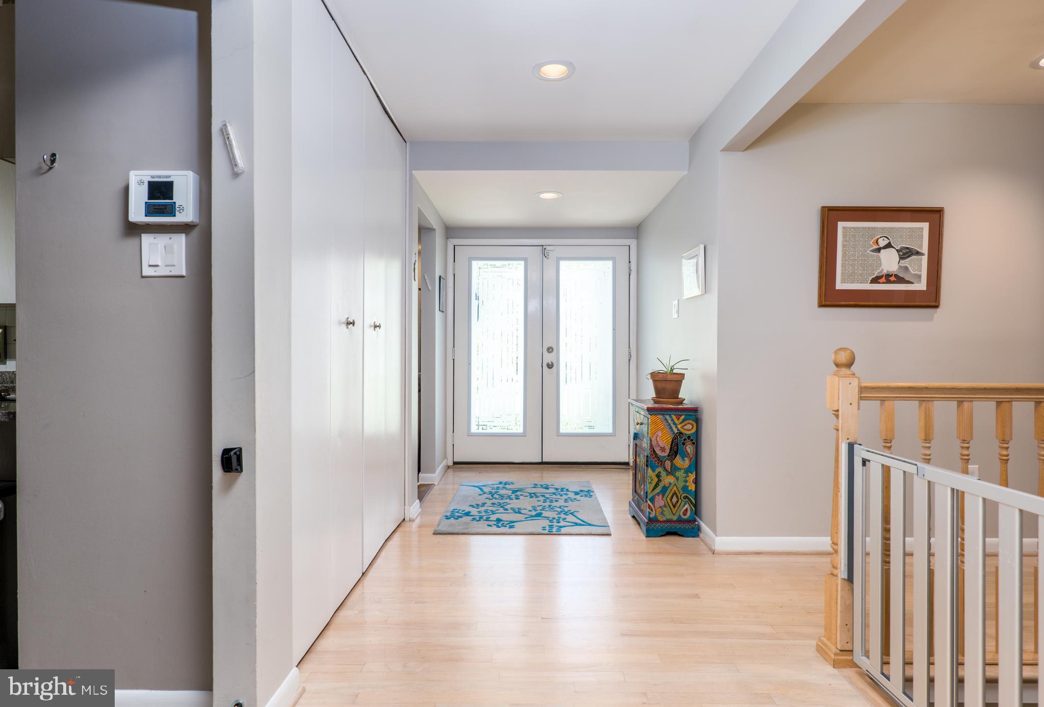 7209 Verbena Road Baltimore, MD 21209 - Photo 2 of 42 welcoming foyer with sunlit glass doors
