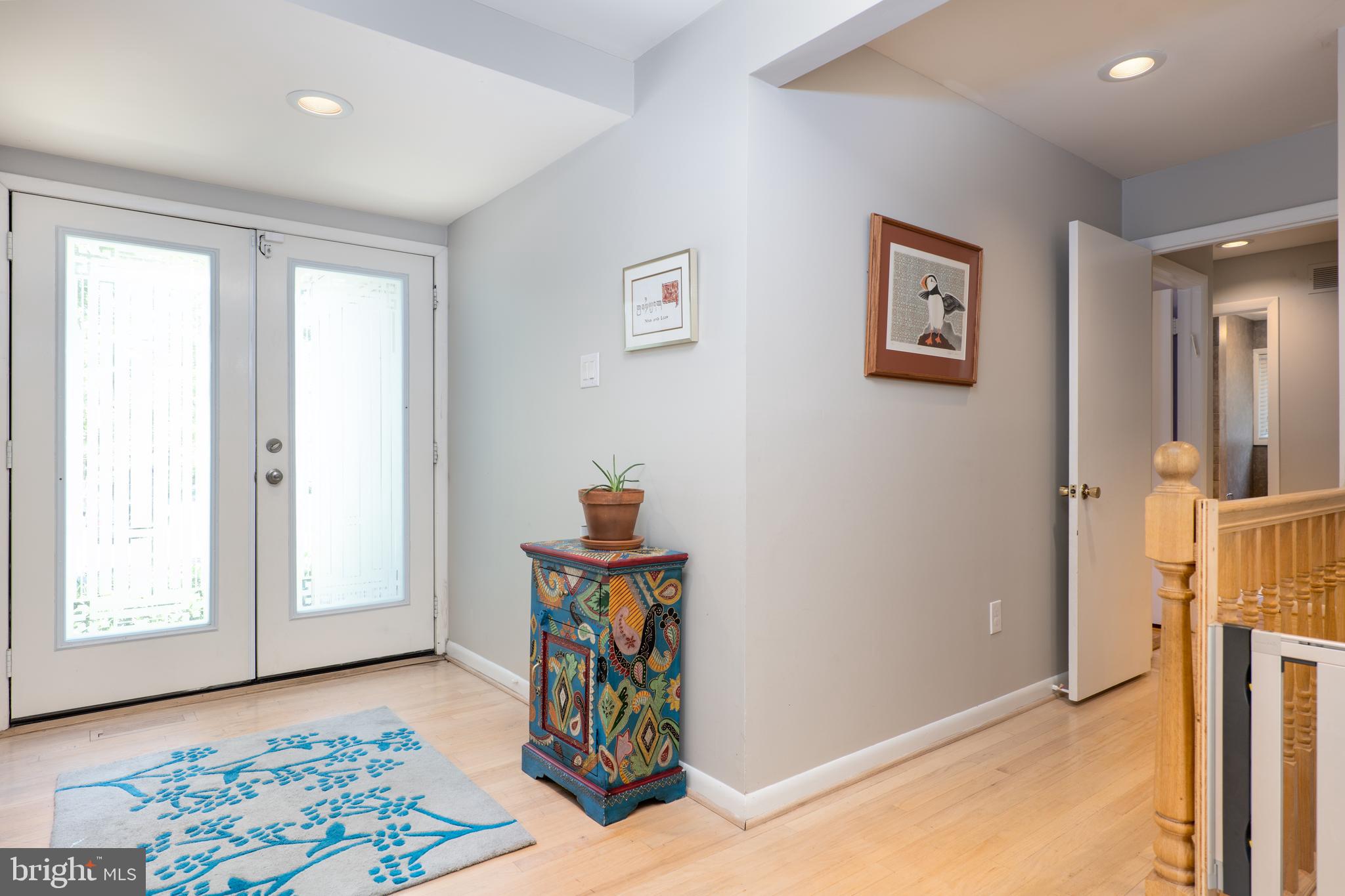 7209 Verbena Road Baltimore, MD 21209 - Photo 12 of 42 foyer w glass doors leading to bedroom area