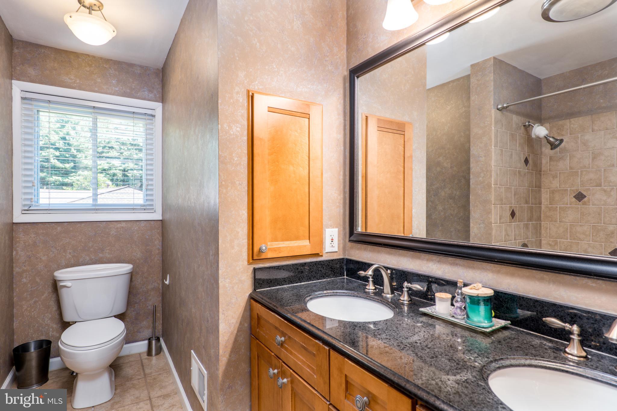 7209 Verbena Road Baltimore, MD 21209 - Photo 18 of 42 updated hall bath w dual sinks