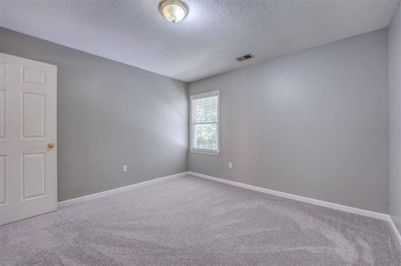 1189 Macon Ridge Drive Collierville, TN 38017 - Photo 15 of 22 a view of an empty room with a window