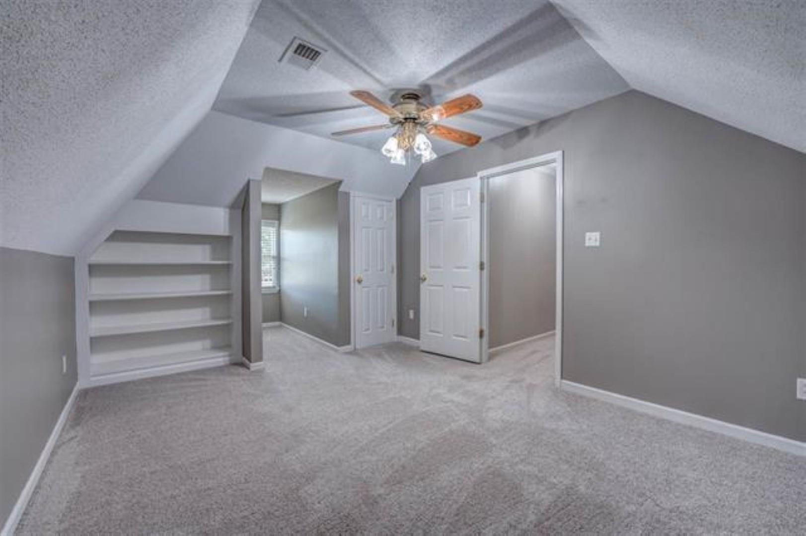 1189 Macon Ridge Drive Collierville, TN 38017 - Photo 16 of 22 a view of an empty room and a ceiling fan