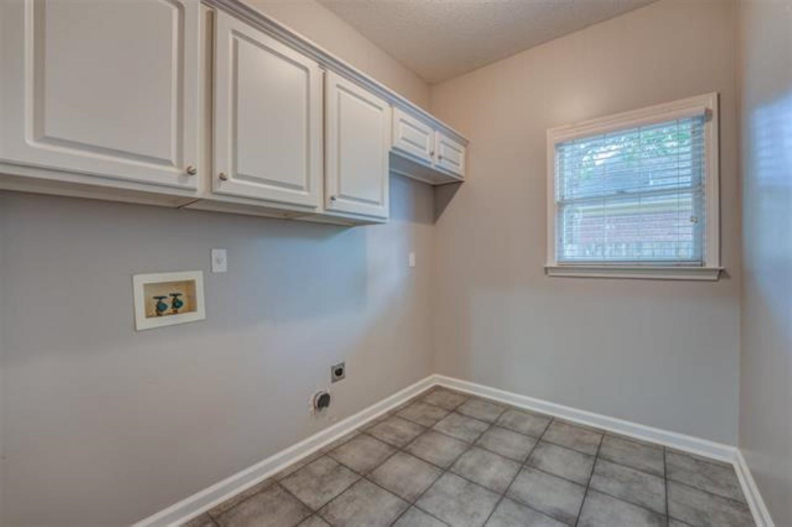 1189 Macon Ridge Drive Collierville, TN 38017 - Photo 18 of 22 a view of a kitchen with marble wall
