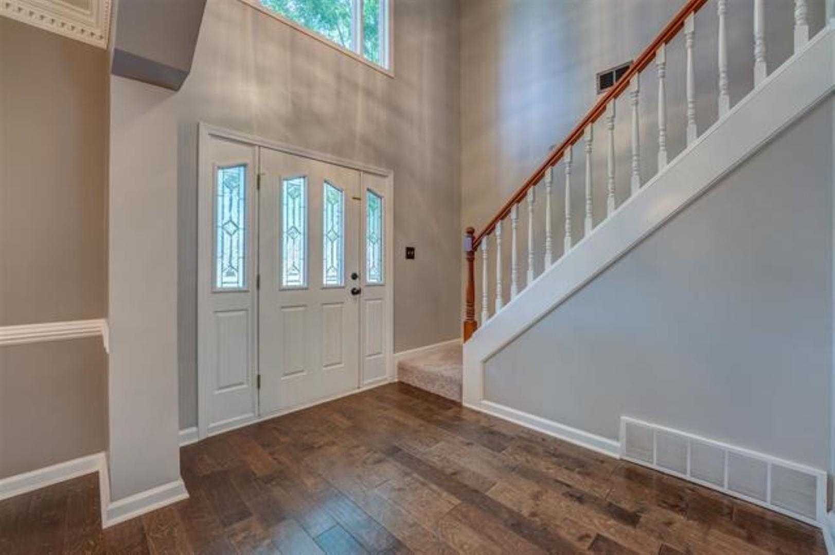1189 Macon Ridge Drive Collierville, TN 38017 - Photo 2 of 22 a view of an entryway with wooden floor