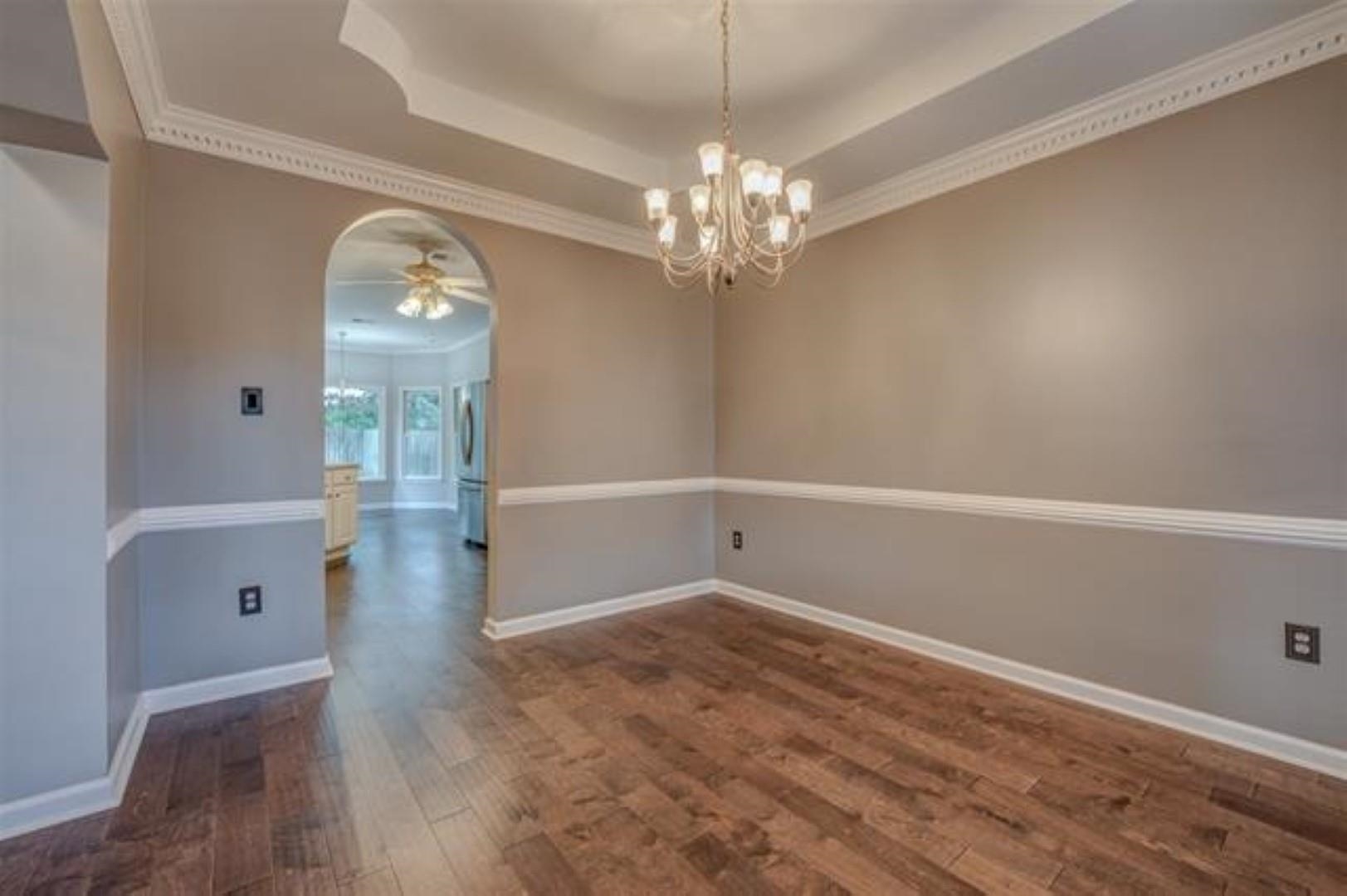 1189 Macon Ridge Drive Collierville, TN 38017 - Photo 4 of 22 wooden floor in an empty room with a window
