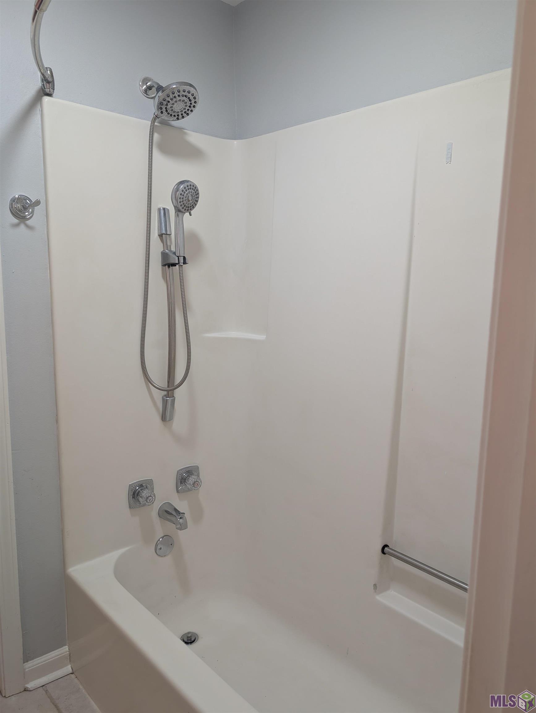 5123 South Oaks Drive Baton Rouge, LA 70816 - Photo 20 of 31 Tub and Shower Upstairs