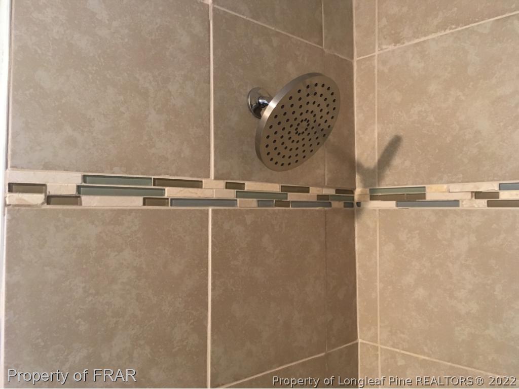 7692 Smithfield Road Godwin, NC 28344 - Photo 20 of 36 a close view of sink shower