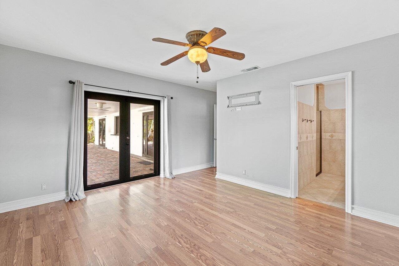 133 Northwest 10th Avenue Boca Raton, FL 33486 - Photo 11 of 25 Primary Bedroom