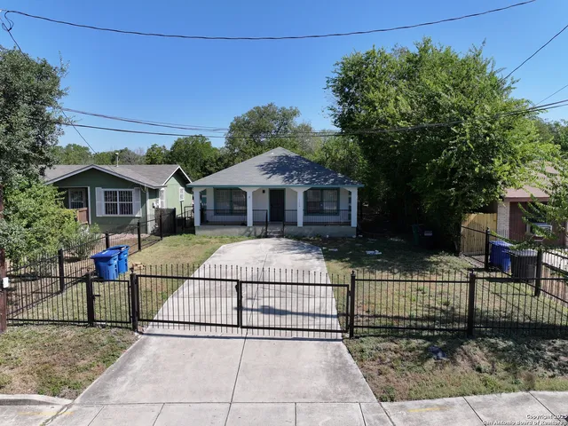 a house view with a garden space