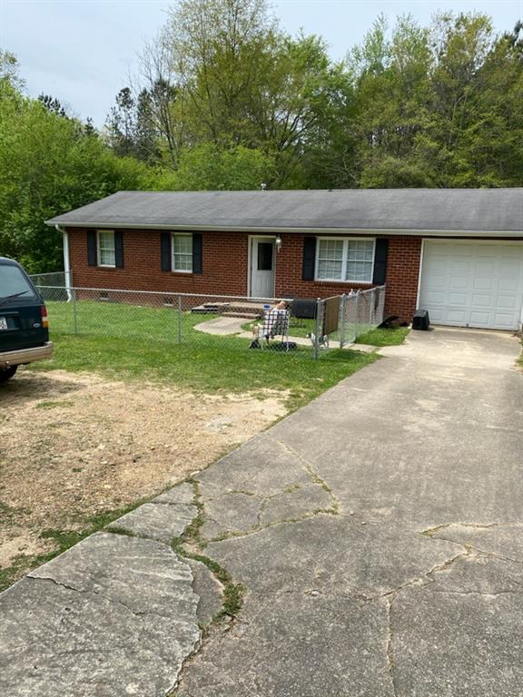 2386 Bellview Road Rockmart, GA 30153 - Photo 1 of 1 a front view of house with deck and yard