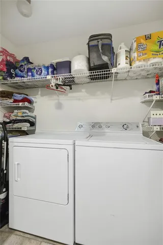 a view of a patio with swimming pool