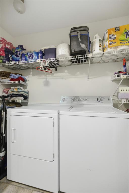 9825 Southwest 202nd Avenue Road Dunnellon, FL 34431 - Photo 40 of 69 a utility room with dryer and washer