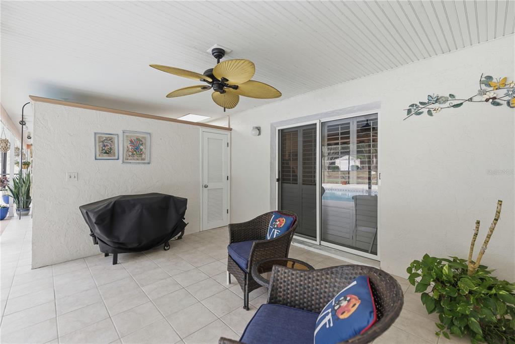 9825 Southwest 202nd Avenue Road Dunnellon, FL 34431 - Photo 46 of 69 a living room with furniture and a rug