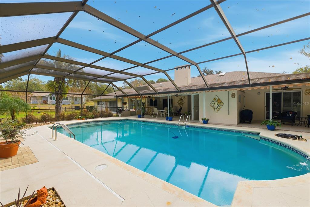 9825 Southwest 202nd Avenue Road Dunnellon, FL 34431 - Photo 49 of 69 a view of a patio with swimming pool