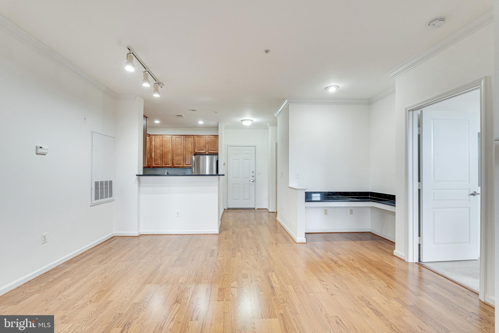 12000 Market Street, Unit 370 Reston, VA 20190 - Photo 12 of 35 a view of a kitchen with a sink and a stove top oven