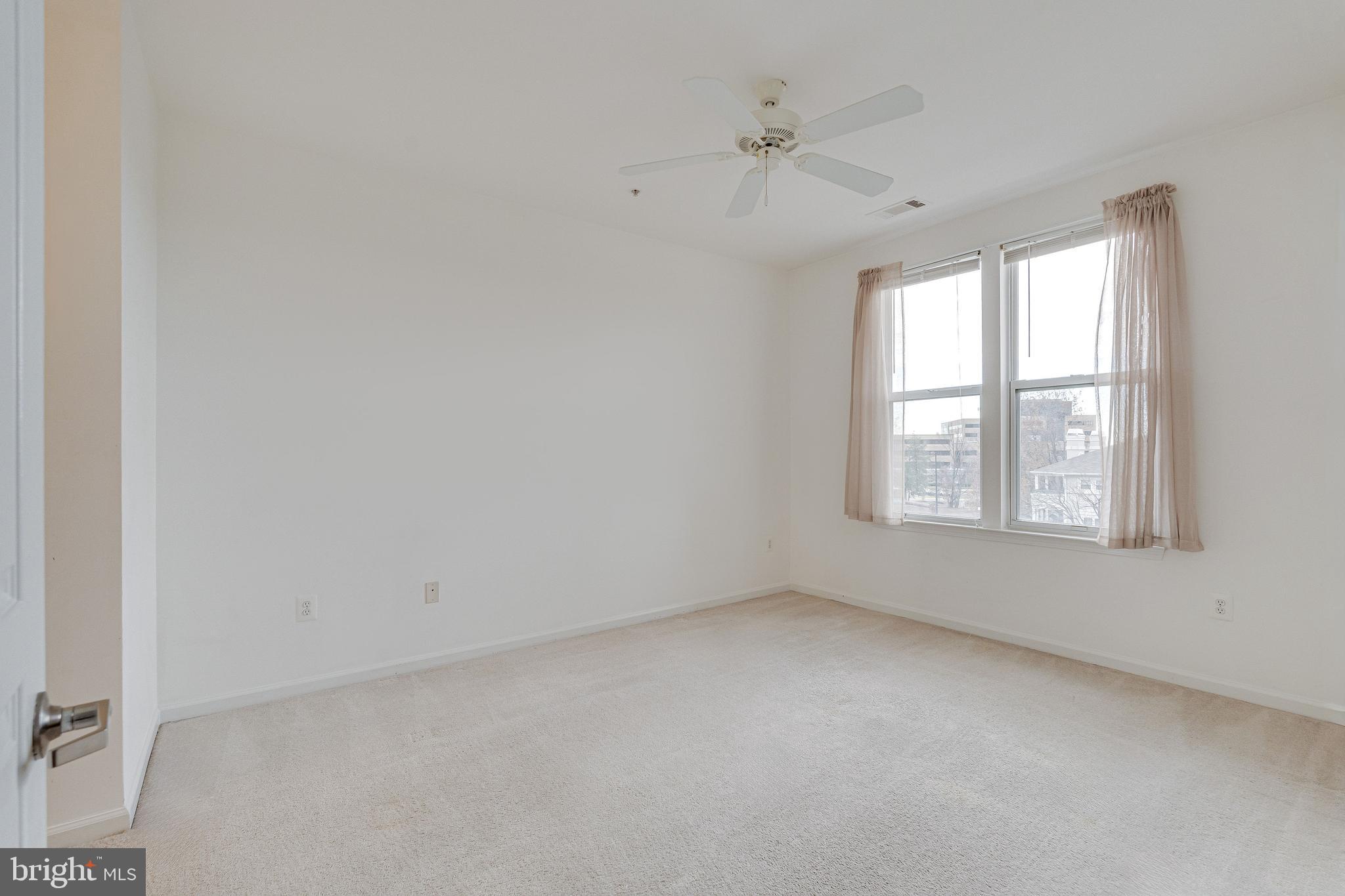 12000 Market Street, Unit 370 Reston, VA 20190 - Photo 19 of 35 an empty room with a window