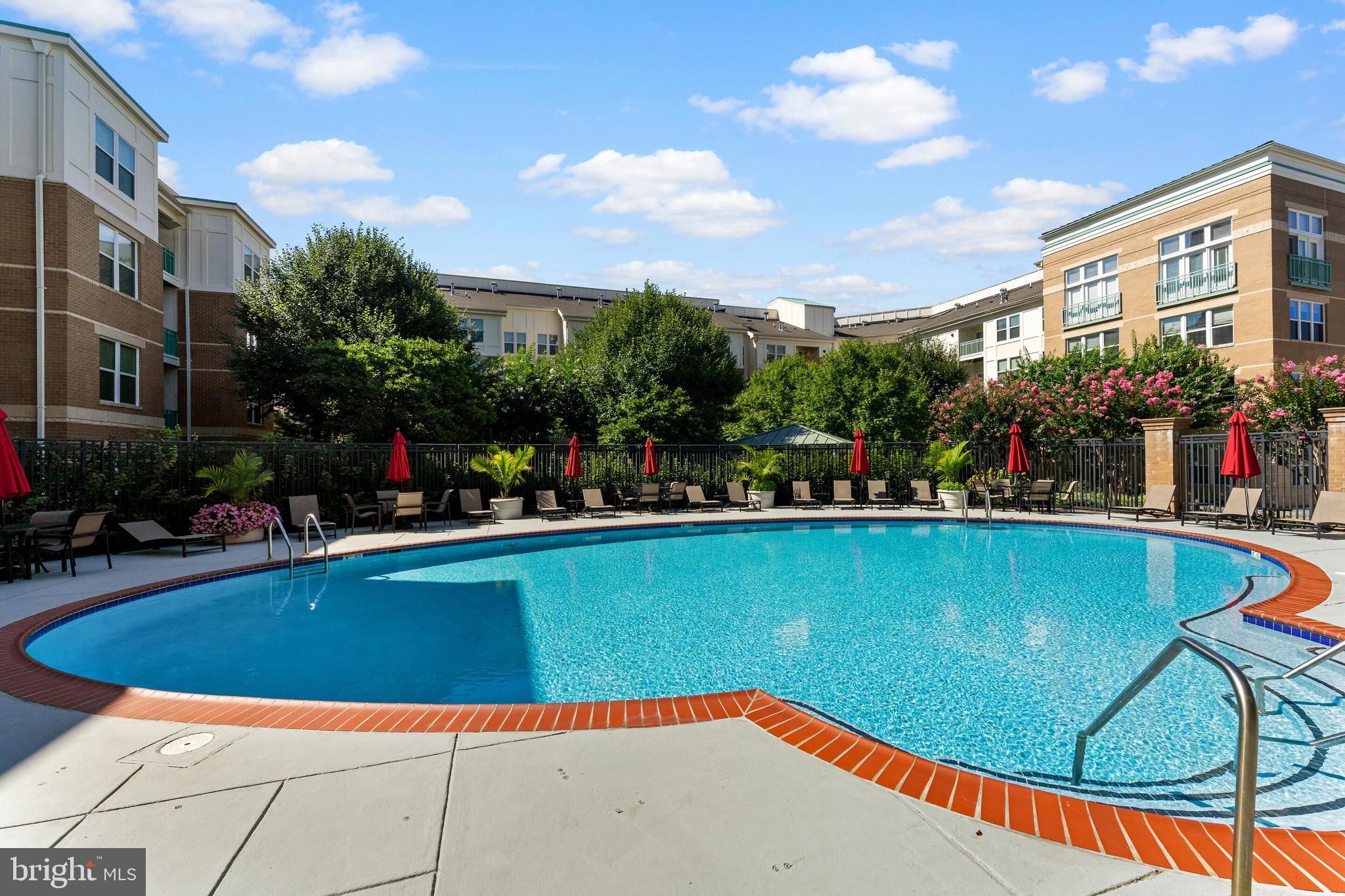 12000 Market Street, Unit 370 Reston, VA 20190 - Photo 34 of 51 a view of swimming pool with outdoor seating
