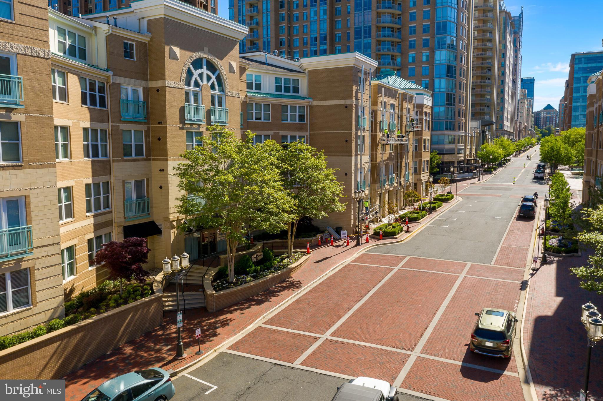 12000 Market Street, Unit 370 Reston, VA 20190 - Photo 35 of 51 a view of a city street lined with buildings