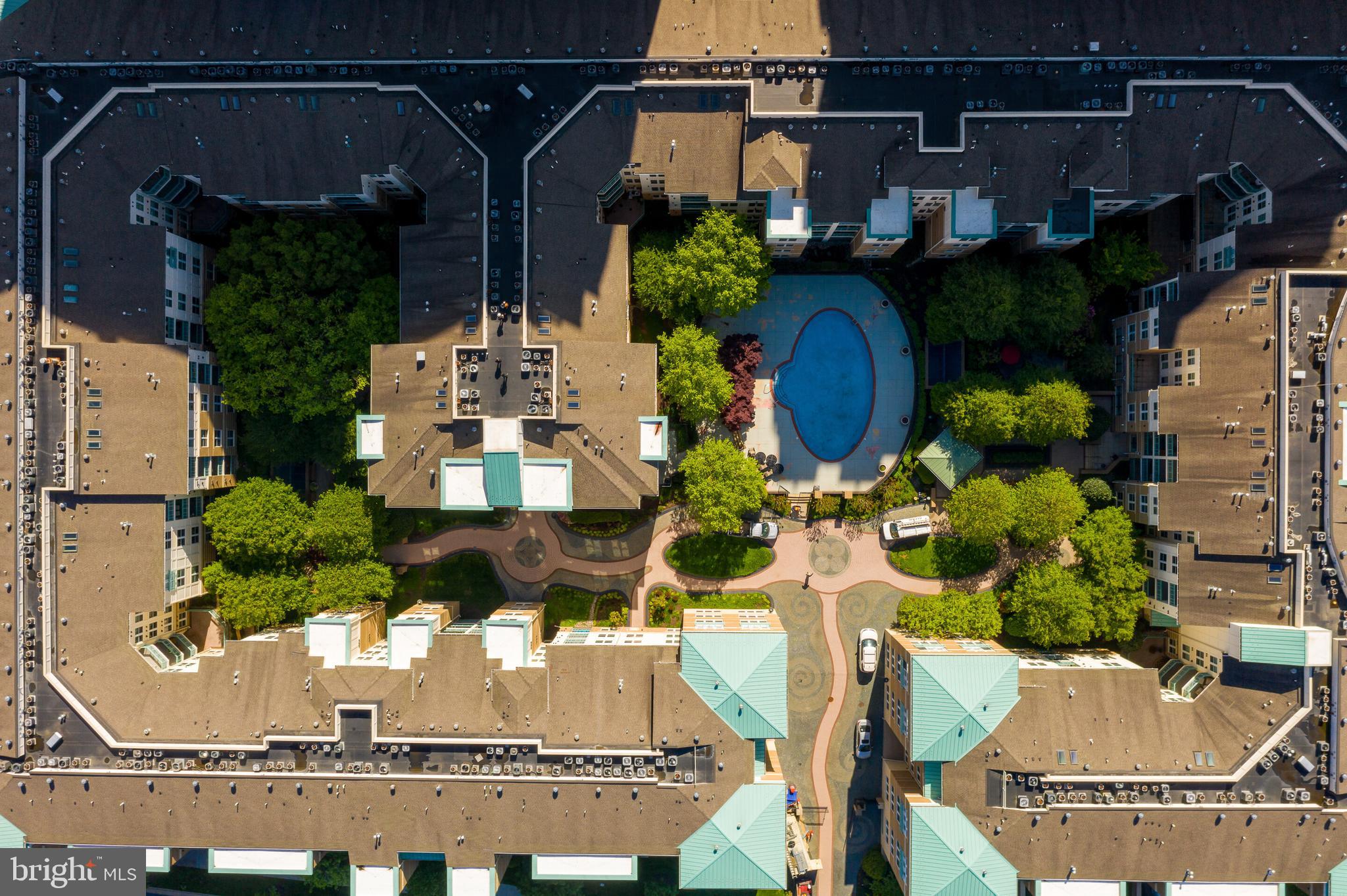 12000 Market Street, Unit 370 Reston, VA 20190 - Photo 44 of 51 an aerial view of a house with a swimming pool