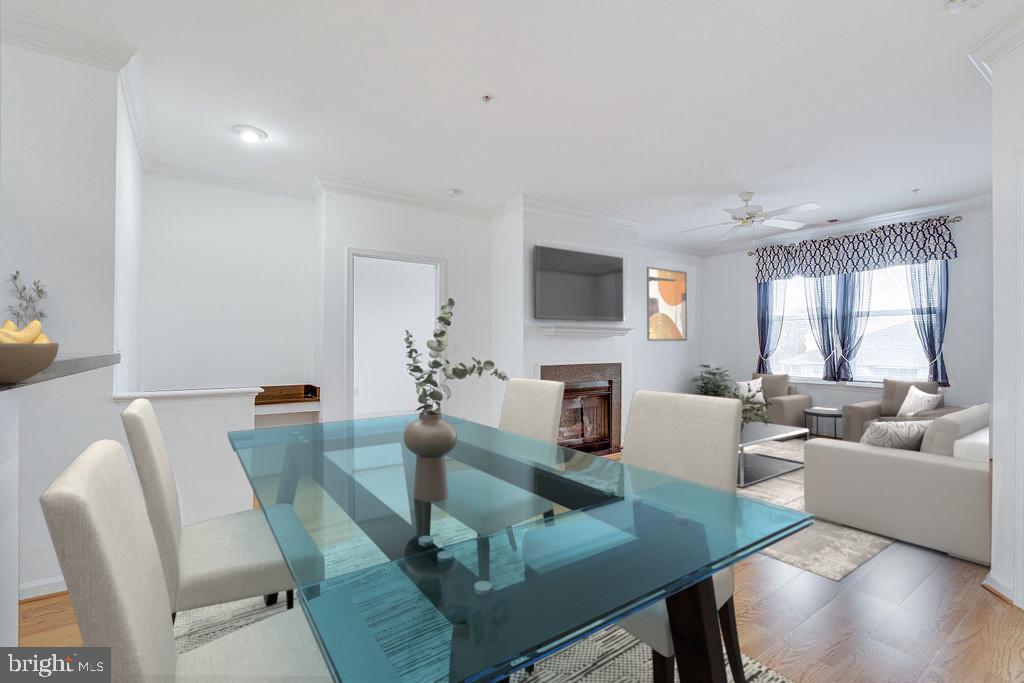12000 Market Street, Unit 370 Reston, VA 20190 - Photo 9 of 35 a living room with furniture and a flat screen tv