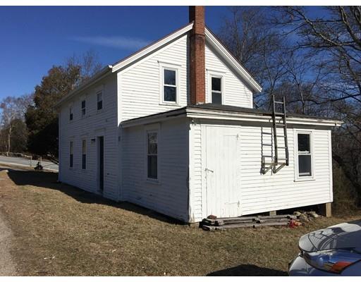 8 Old Stone Church Road Little Compton, RI 02837 - Photo 2 of 5 a front view of a house with a yard