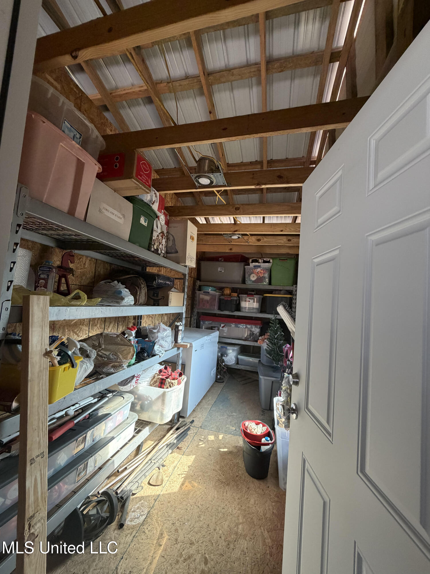 135 Burger Road Petal, MS 39465 - Photo 2 of 21 Large storage room in carport
